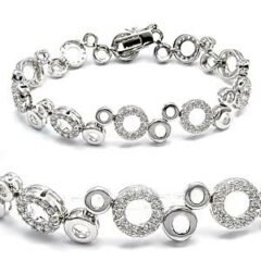 Elegant vitguldpläterad armband med cirklar och klara cubic zirconia stenar